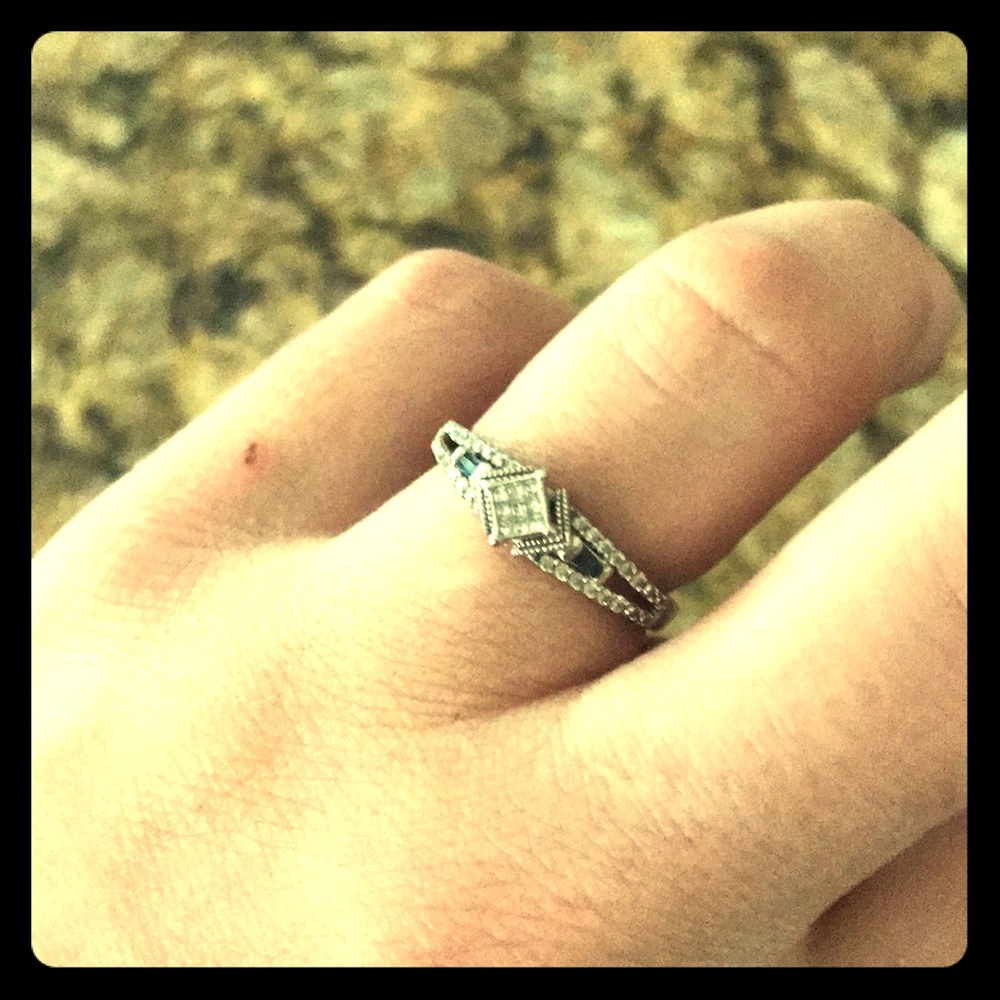 Woman’s diamond promise ring